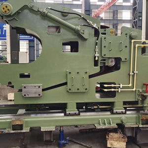 Coil strapping auxiliary machine